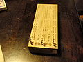 cribbage board with pegs and cherry hearts
